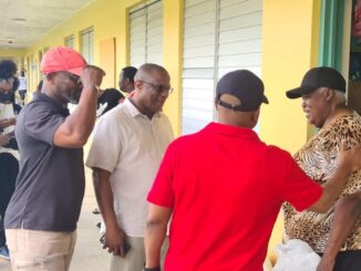 MPs Michael Pintard, Kwasi Thompson, and Iram Lewis visit GB shelters after Tropical Storm Nicole.