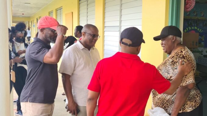 MPs Michael Pintard, Kwasi Thompson, and Iram Lewis visit GB shelters after Tropical Storm Nicole.